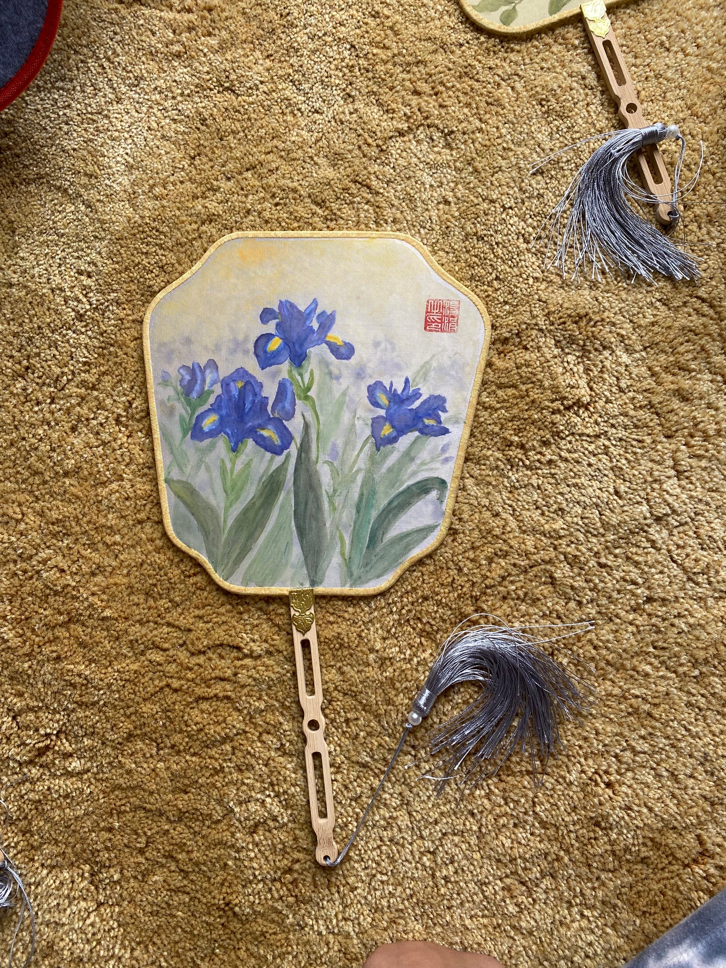 Traditional Chinese brush paintings on silk fans