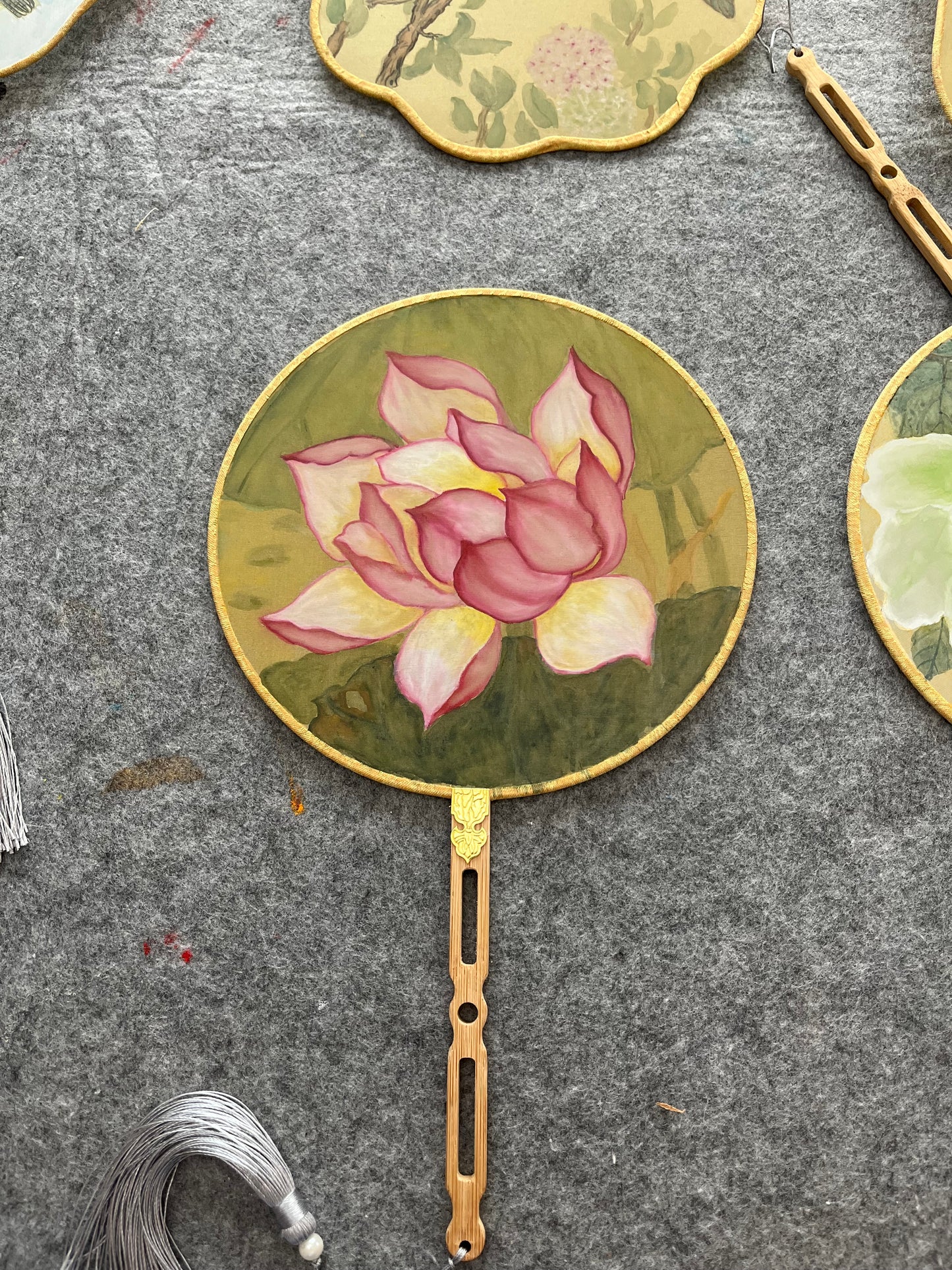 Traditional Chinese brush paintings on silk fans
