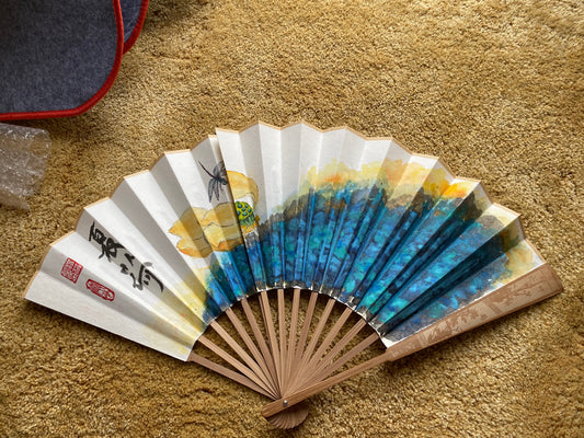 Traditional Chinese brush paintings on folding fans