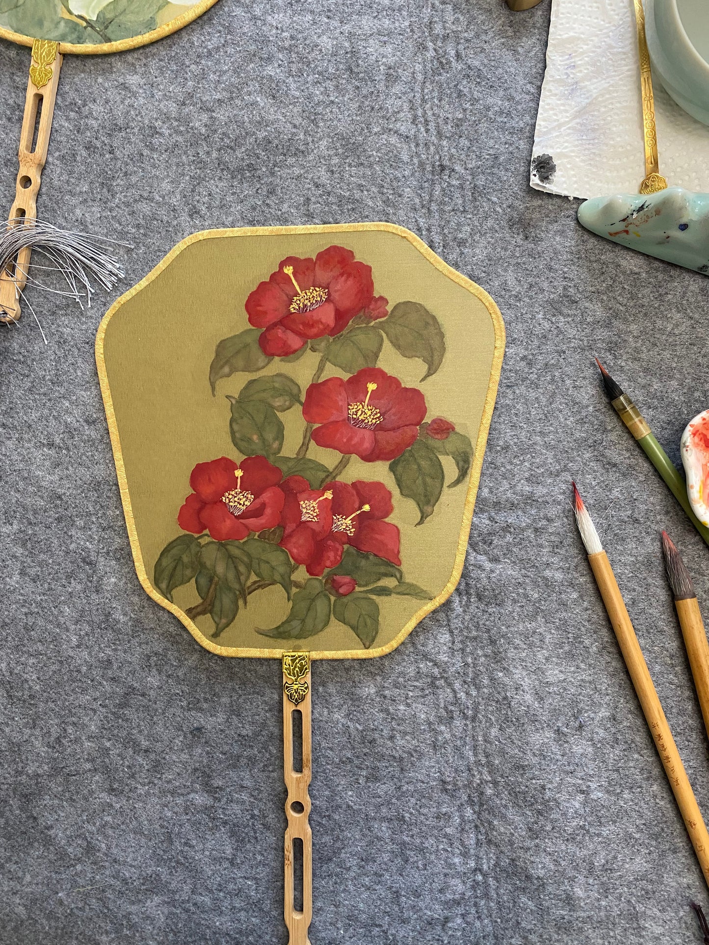 Traditional Chinese brush paintings on silk fans